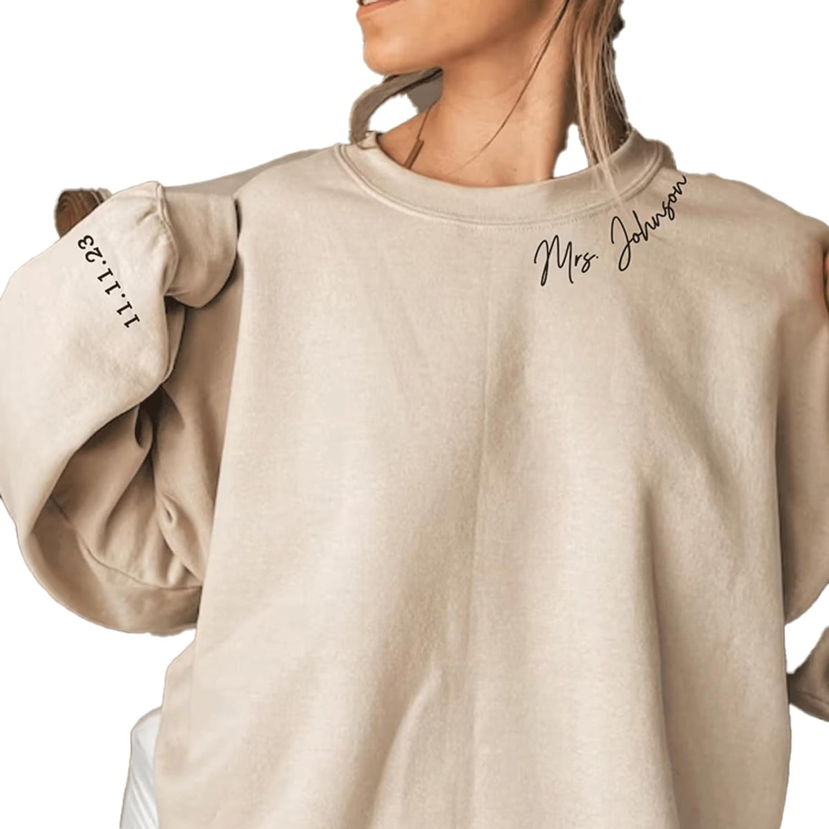 a woman with a ponytail wearing a sweatshirt