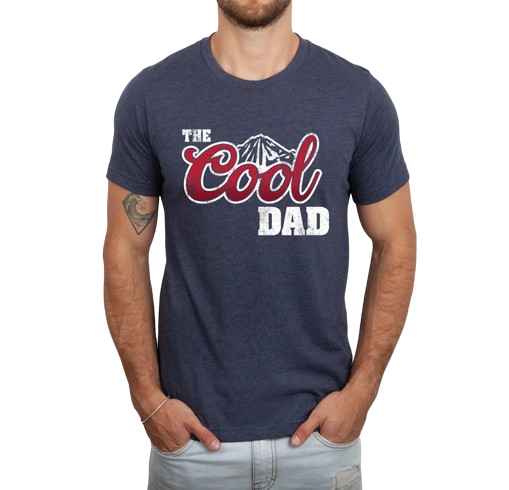 a man wearing a t - shirt that says the cool dad