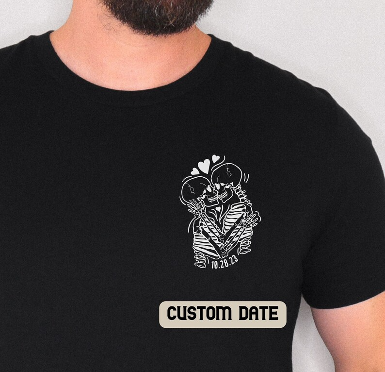 a man with a beard wearing a black t - shirt that says custom date