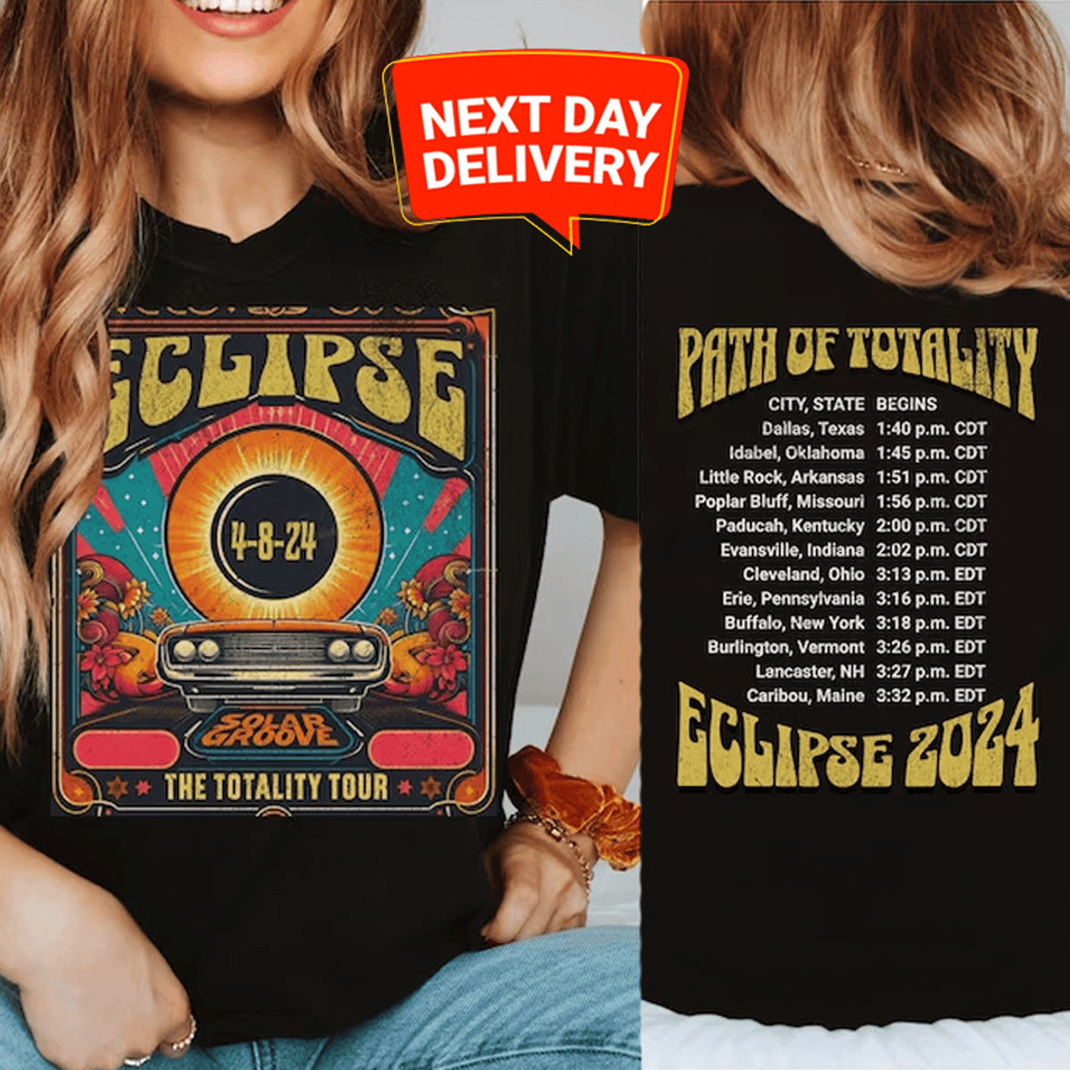 a woman wearing a black eclipse tour shirt