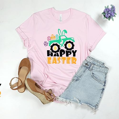 a pink shirt that says happy easter next to a pair of shorts